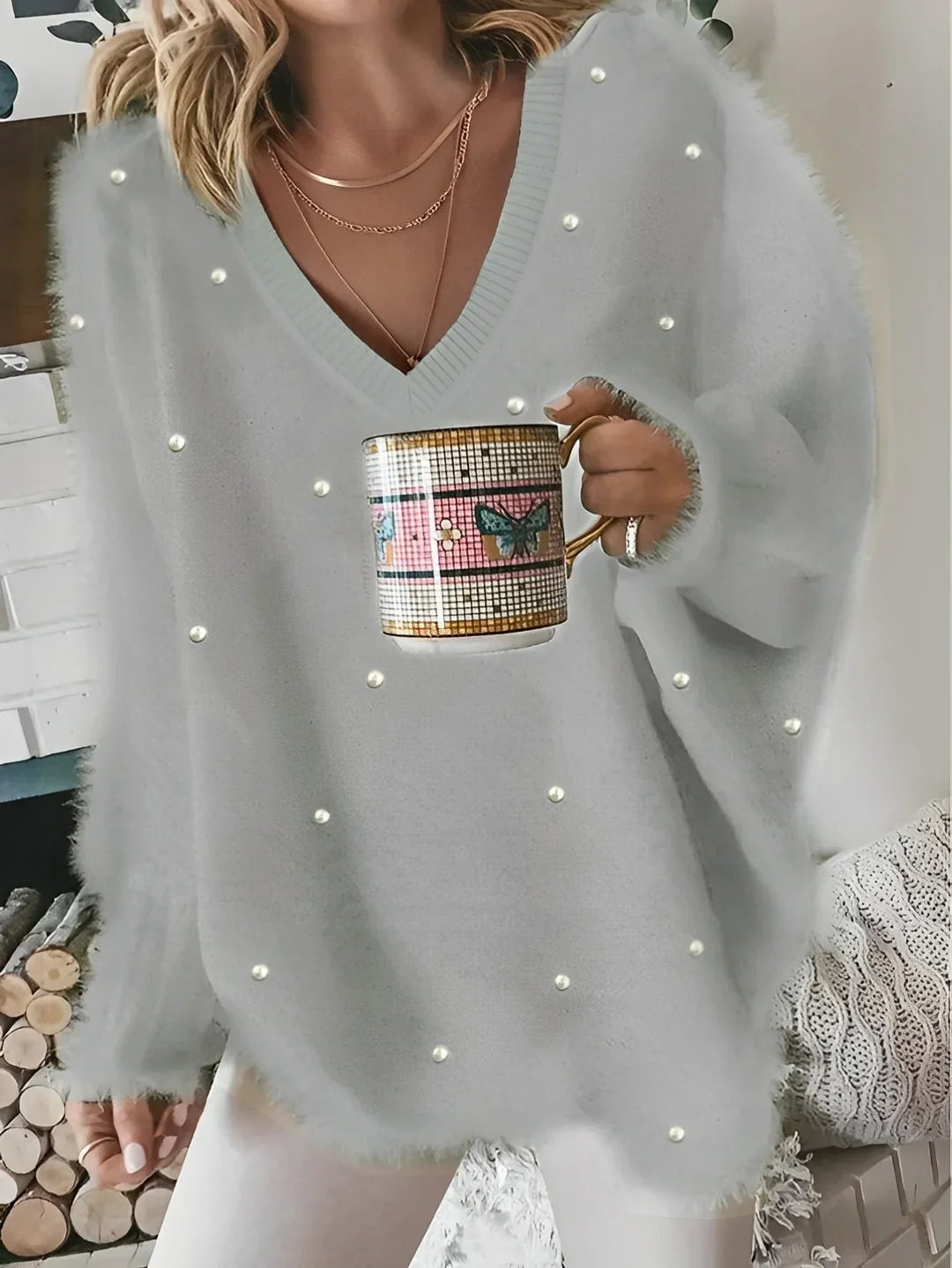 Aurora Pull doux avec perles décoratives